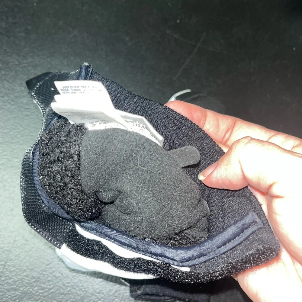 Obermeyer black and white kid’s fleece-lined mittens